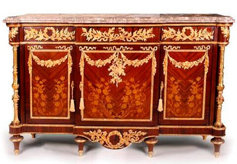 A Sumptuous French style ormolu-mounted veneer and marquetry inlaid commode a vantaux after the model Frédéric Durand et Fils, based on a model by Martin Carlin, Paris, Last Quarter 19th Century,The breakfront shaped eared marble top above a conforming case set with frieze drawers ornamented with swags and ribbon-tied loose bouquets pierced interlaced laurel garlands 
Over three cupboard doors inlaid with naturalistic flowers marquetry patterns, the paneled doors hung with ormolu blossoming pendant garlands, the sides similarly decorated, The angles with astonishing turned fluted columnar angle supports over a shaped frieze and raised on six ormolu toupie feet